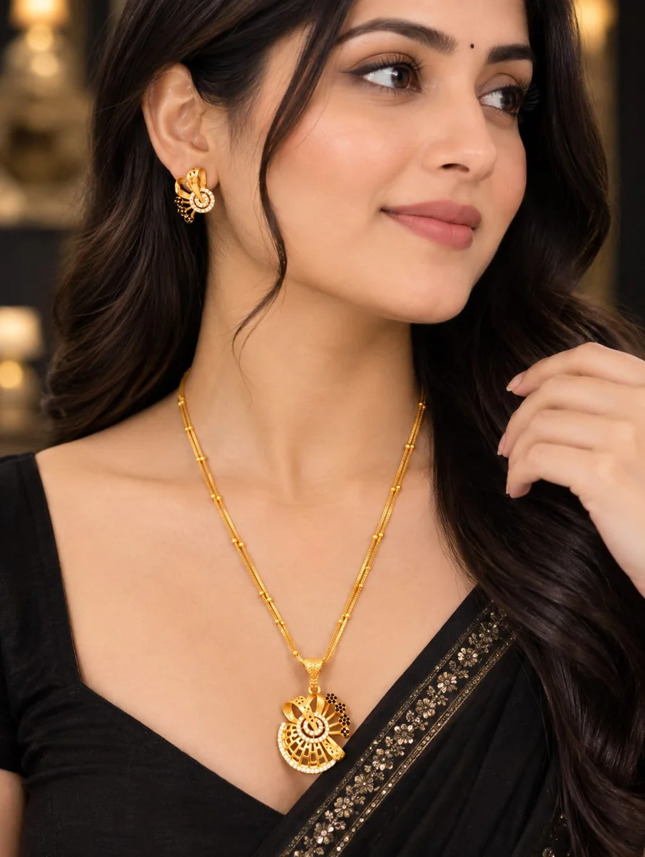 Front view of handcrafted brass Aadhra Golden Spiral Charm Necklace Set with antique gold polish