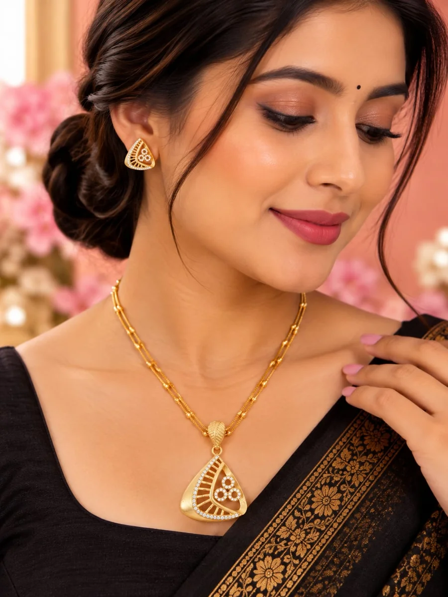Front view of handcrafted brass Aadhra Royal Triangle Motif Necklace Set with antique gold polish