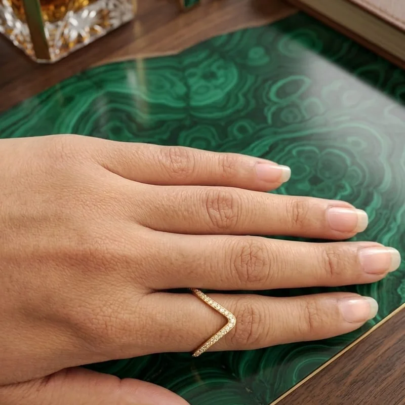 Front view of handcrafted brass Diamond Chevron Pavé Ring with antique gold polish