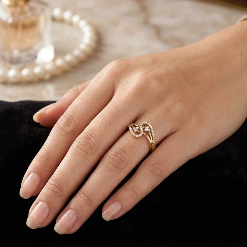 Front view of handcrafted brass Diamond Leaf Loop Ring with antique gold polish