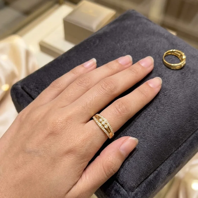 Front view of handcrafted brass Petal Bow Pavé Ring with antique gold polish